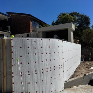 Curved raised pool wall